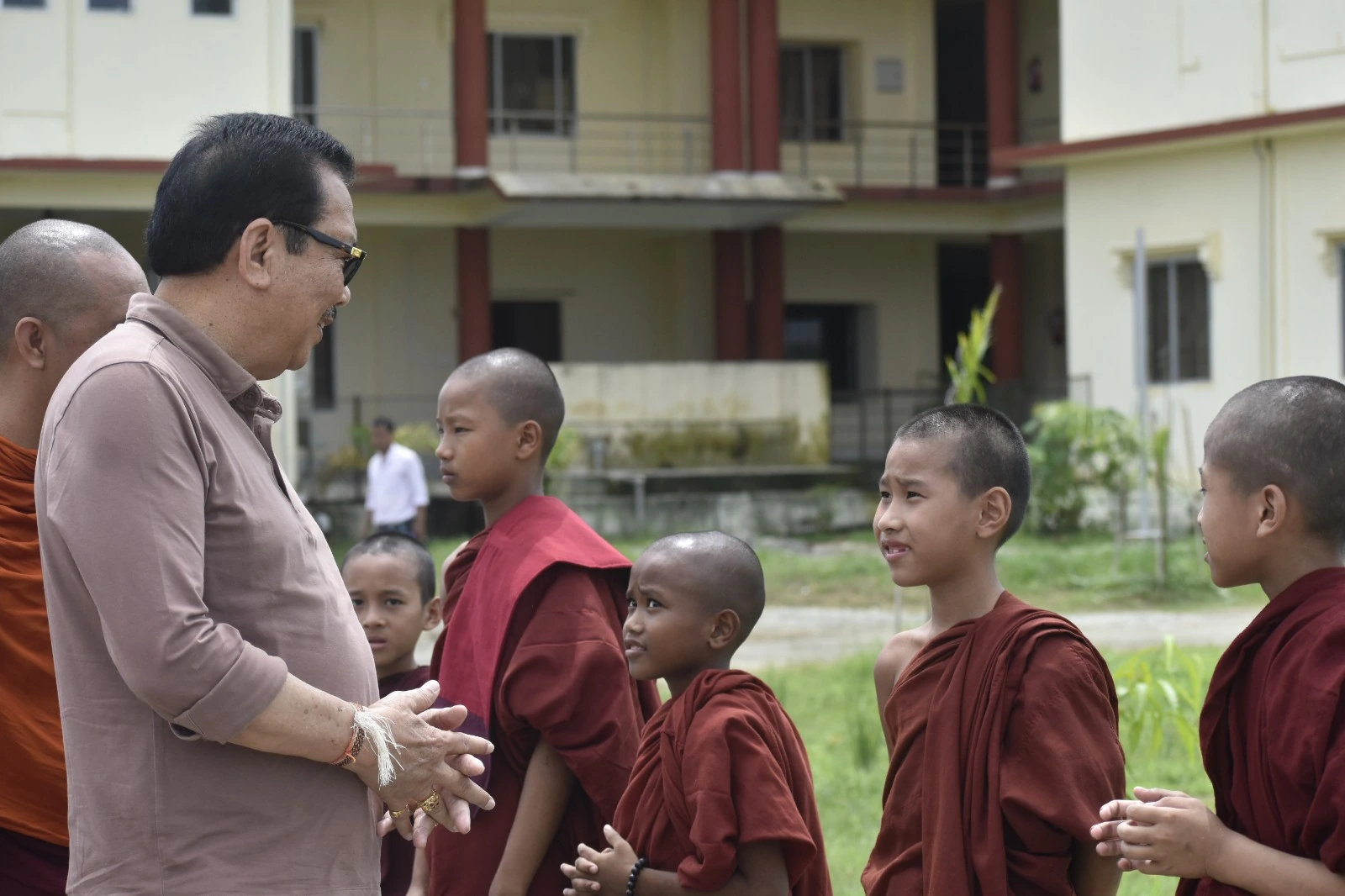 A conversation in the campus grounds