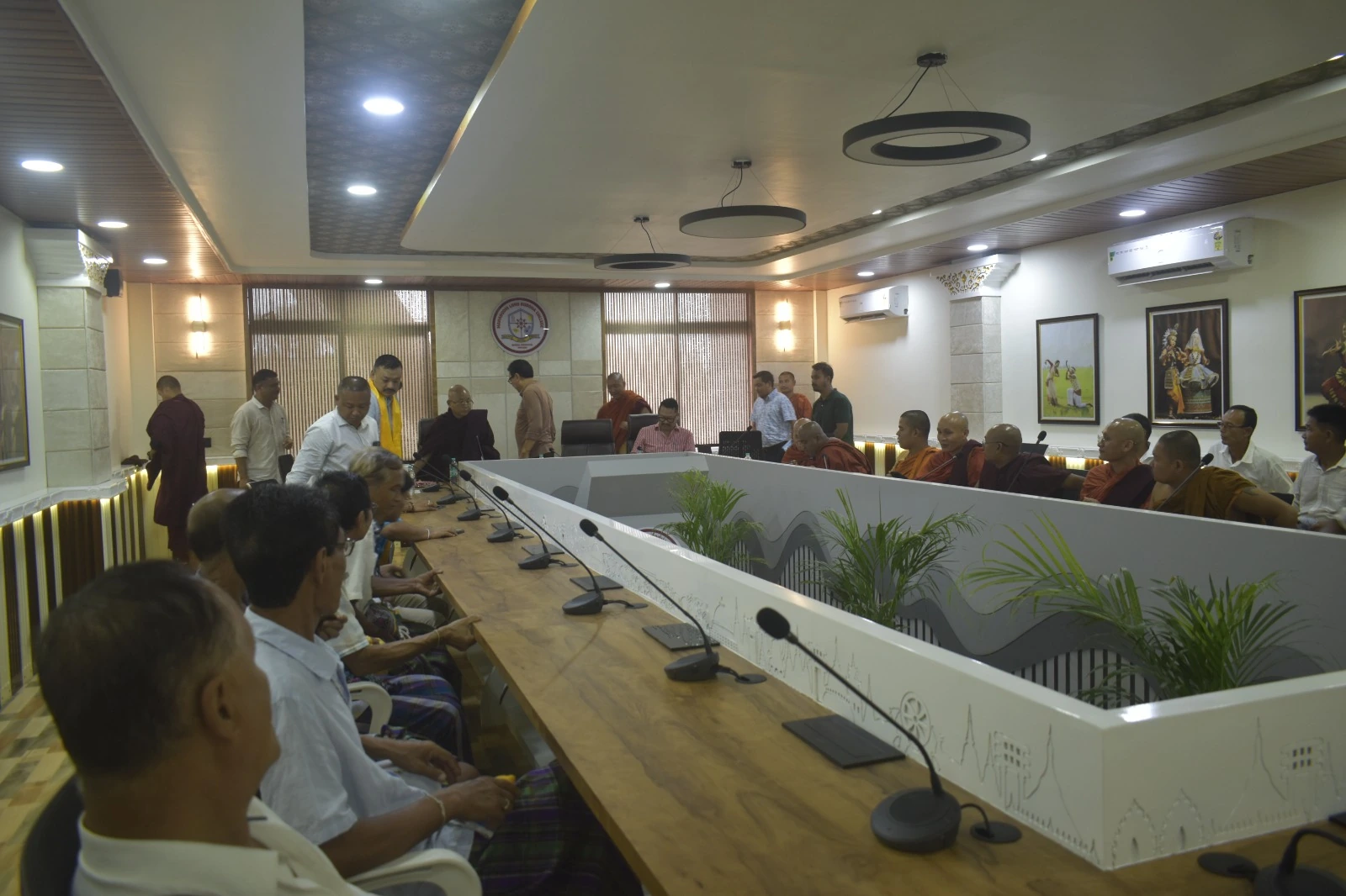 A discussion around the college conference table